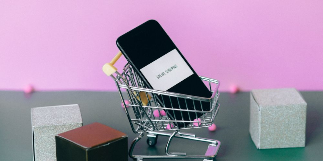 A shooping cart carrying a cell phone